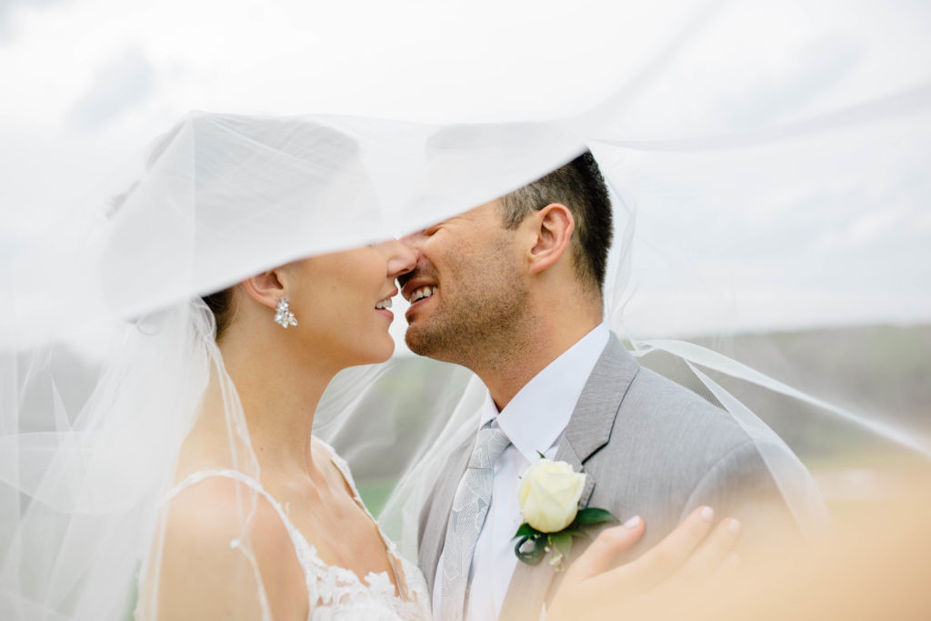Bride and Groom veil photo