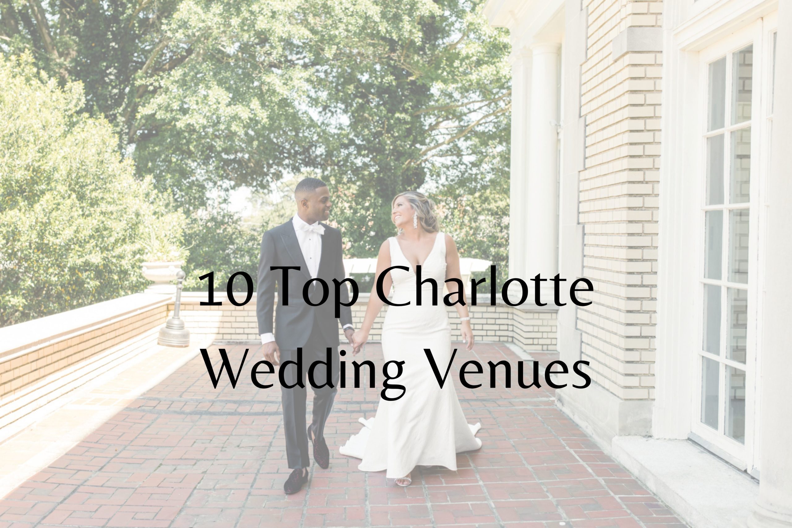 Groom, in black suit, walking with his bride, in a white gown, on the porch at Separk Mansion in Charlotte NC.