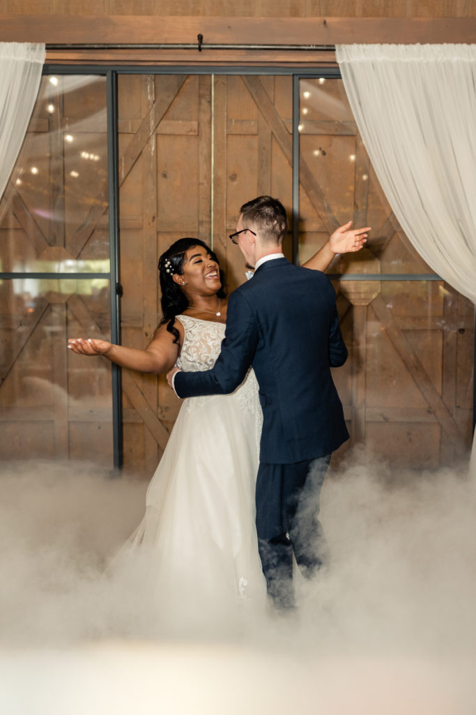 Bride and groom dance for the first time  at Carolina Country weddings venue in Charlotte.